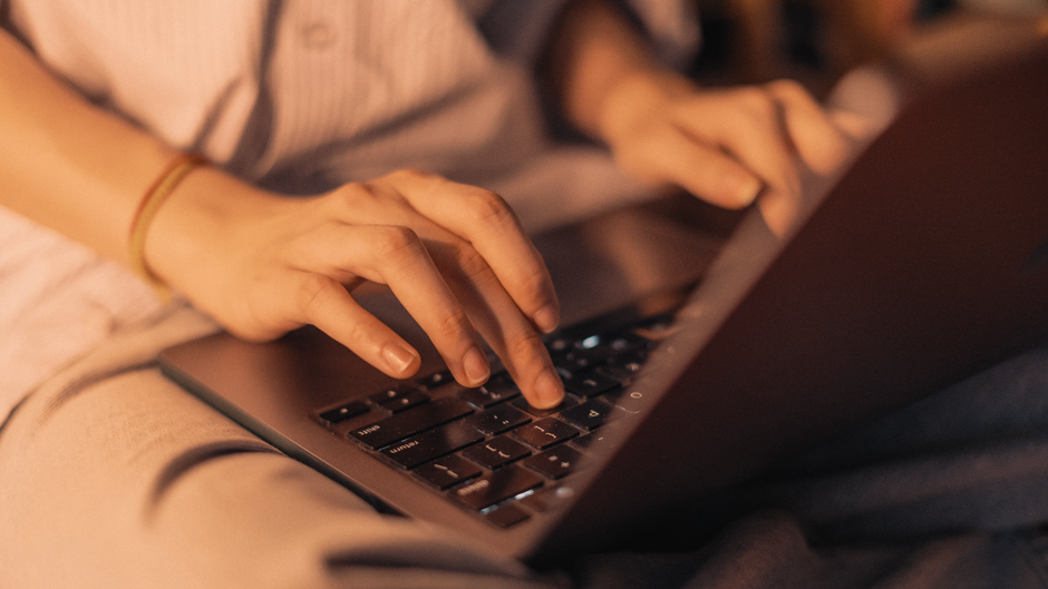Person reviewing personal data and privacy settings on a laptop